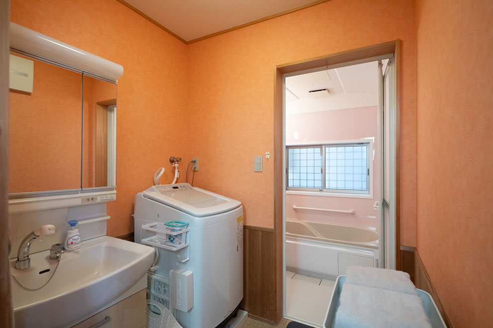 Shower, sink, and washer